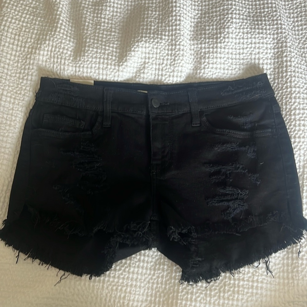 Brand new from Buckle, never worn.  Size 27.  Mid rise/Regular fit